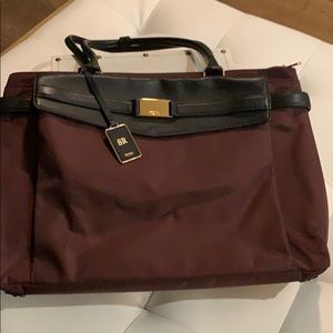Tumi travel briefcase in garnet and black leather
